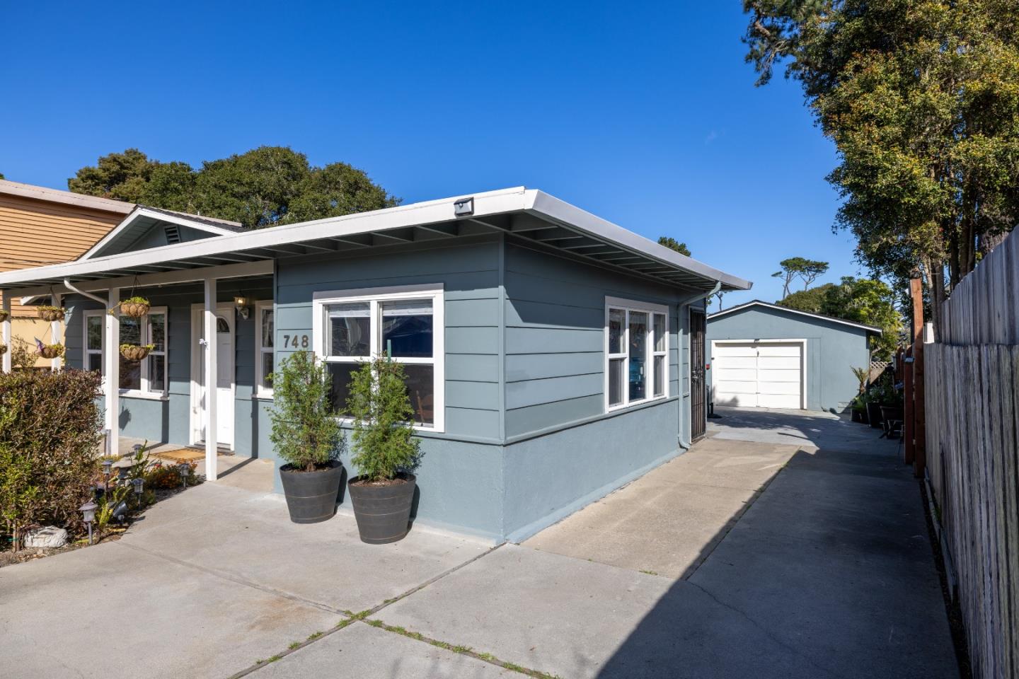 748 Alice Street Monterey, CA 93940 - Photo 35 of 36 a front view of a house with garden