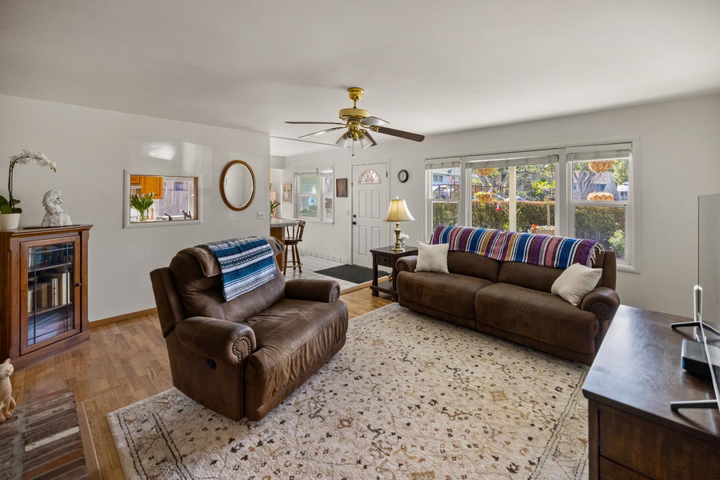 748 Alice Street Monterey, CA 93940 - Photo 5 of 36 a living room with furniture and a large window