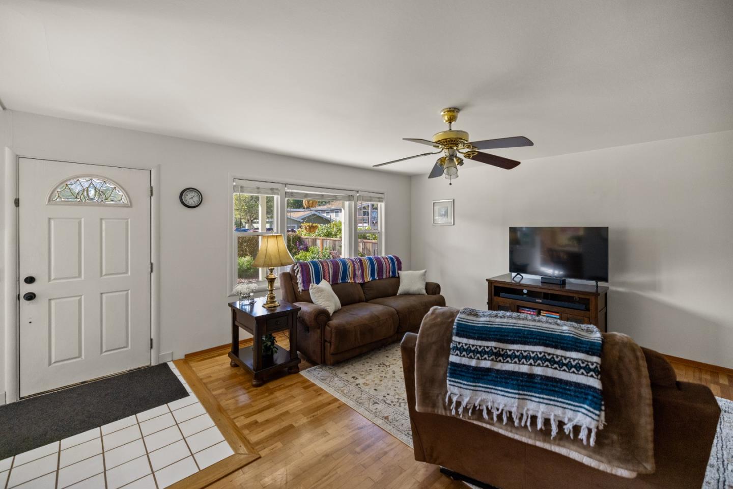748 Alice Street Monterey, CA 93940 - Photo 6 of 36 a living room with furniture and a rug