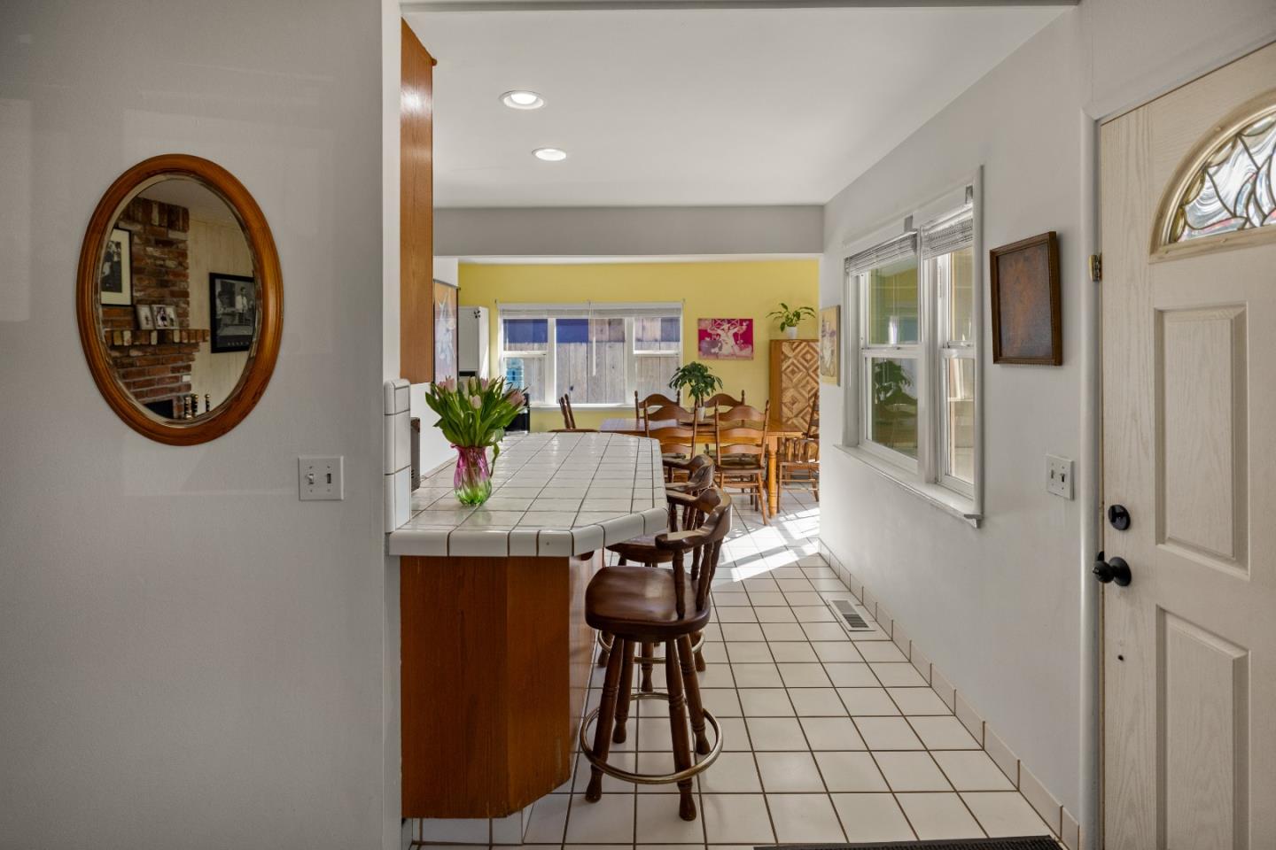 748 Alice Street Monterey, CA 93940 - Photo 10 of 36 a view of a dining room with furniture and a chandelier