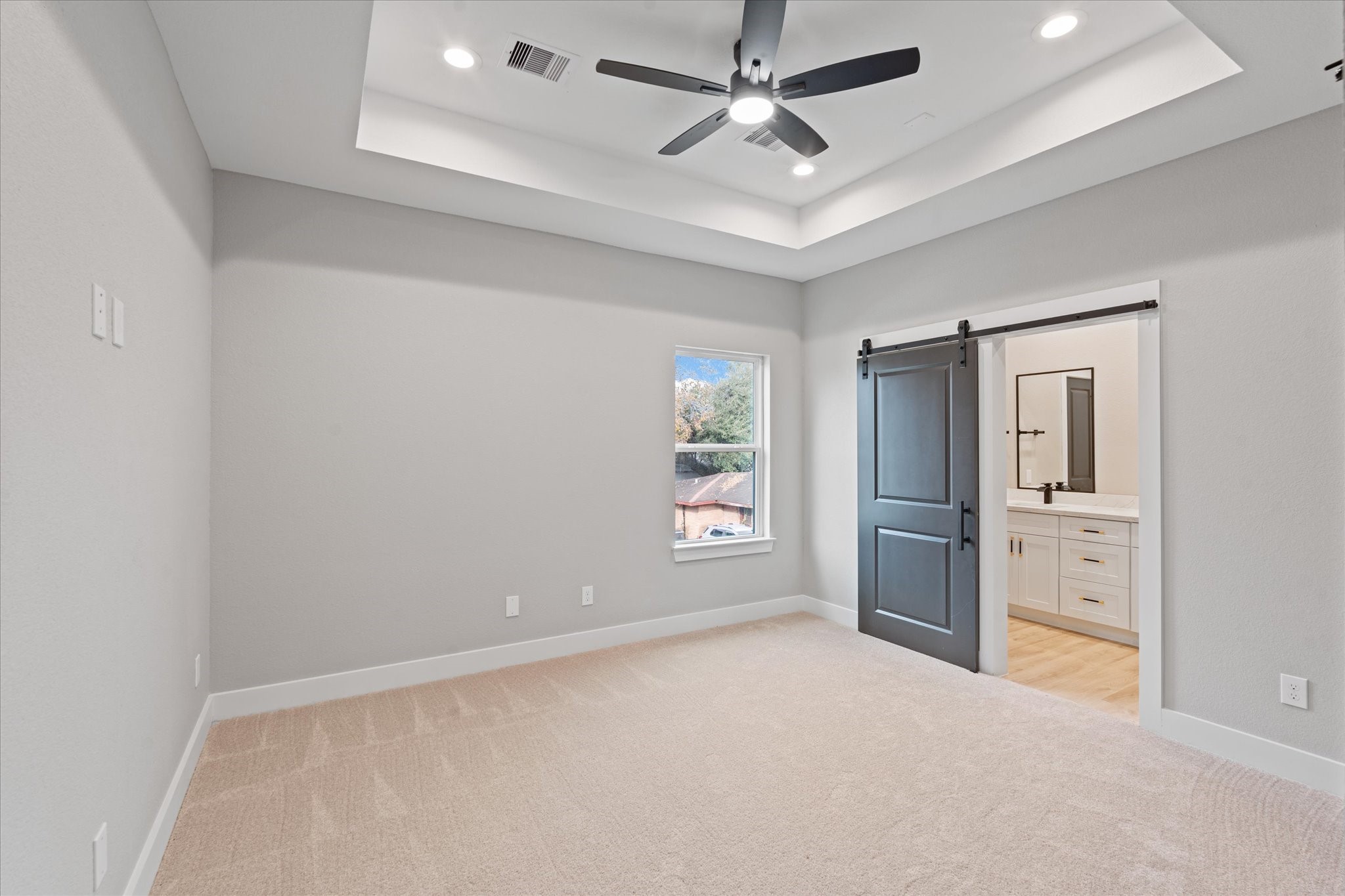 7349 Sandle Street, Unit B Houston, TX 77088 - Photo 12 of 19 wooden floor in an empty room with a window