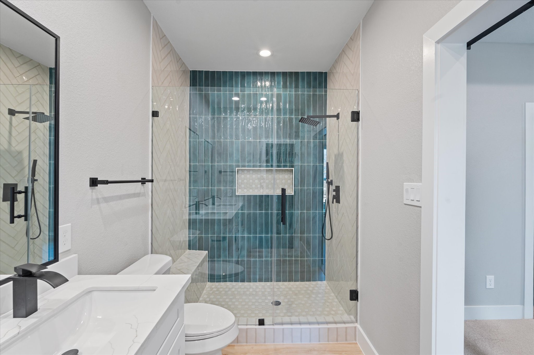 7349 Sandle Street, Unit B Houston, TX 77088 - Photo 13 of 19 a bathroom with a sink toilet and shower