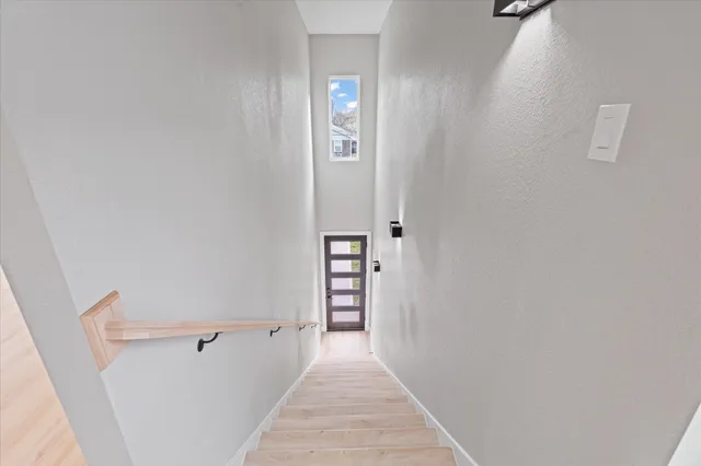 a view of a hallway with closet