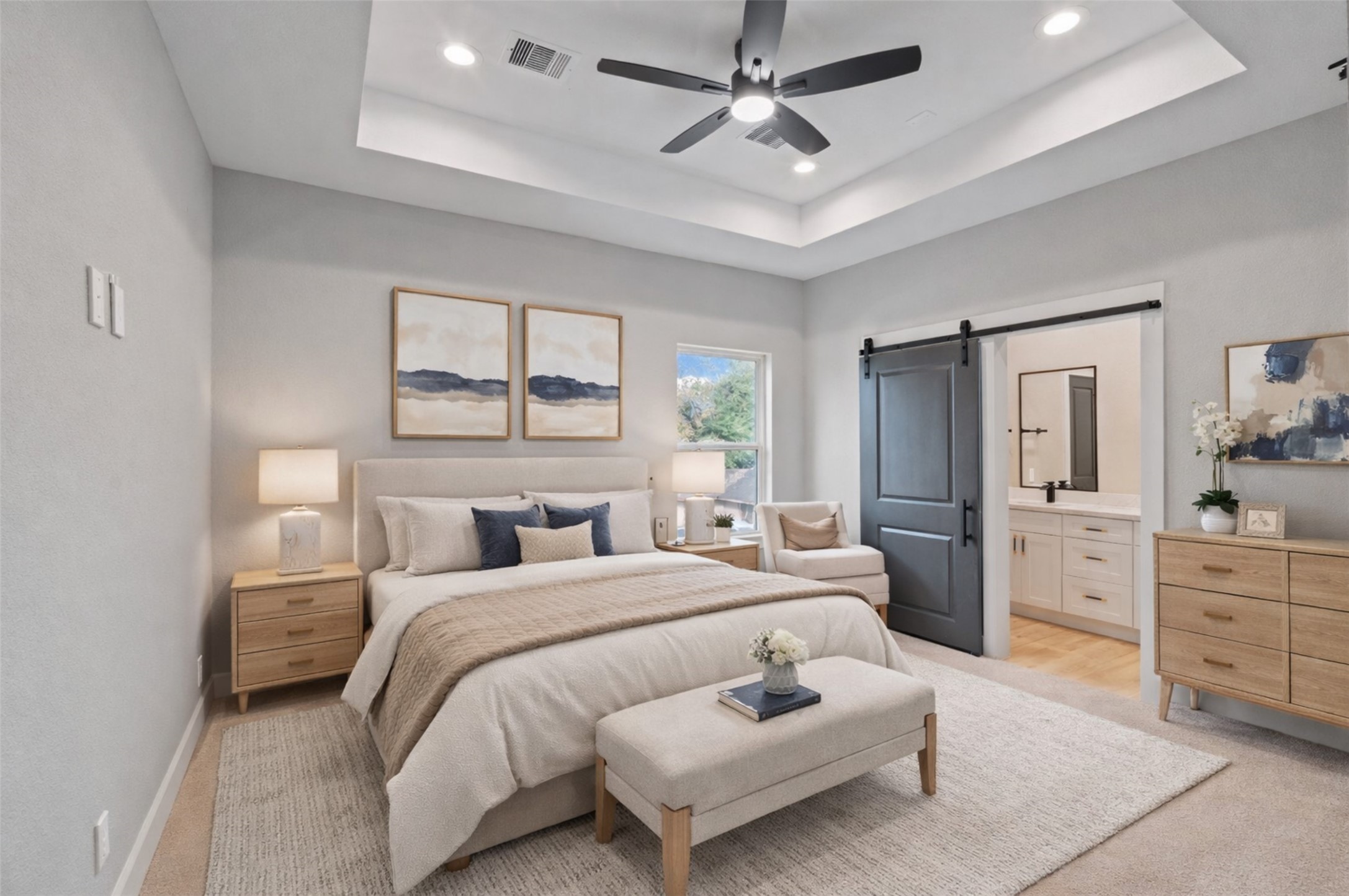 7349 Sandle Street, Unit B Houston, TX 77088 - Photo 3 of 19 a bedroom with a bed and ceiling fan