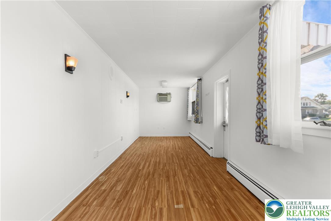 1512 West Broad Street Bethlehem, PA 18018 - Photo 12 of 50 a view of a room with wooden floor and staircase