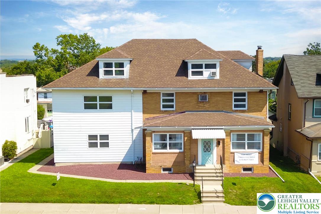 1512 West Broad Street Bethlehem, PA 18018 - Photo 3 of 50 a front view of a house with a yard