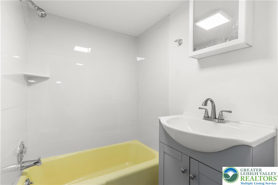 1512 West Broad Street Bethlehem, PA 18018 - Photo 31 of 50 a bathroom with a sink and a bathtub