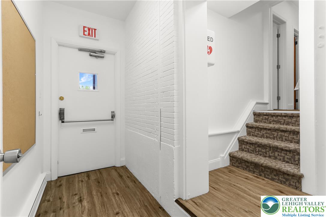 1512 West Broad Street Bethlehem, PA 18018 - Photo 32 of 50 a view of a hallway with wooden floor and entryway