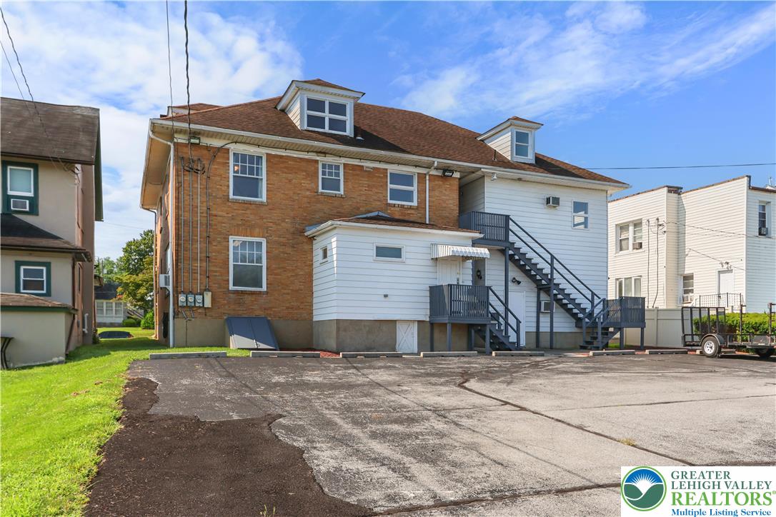 1512 West Broad Street Bethlehem, PA 18018 - Photo 46 of 50 a front view of a house with a yard