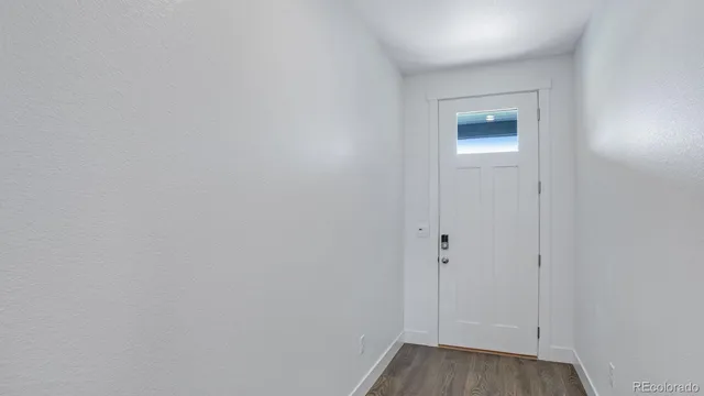 a view of an empty room and closet