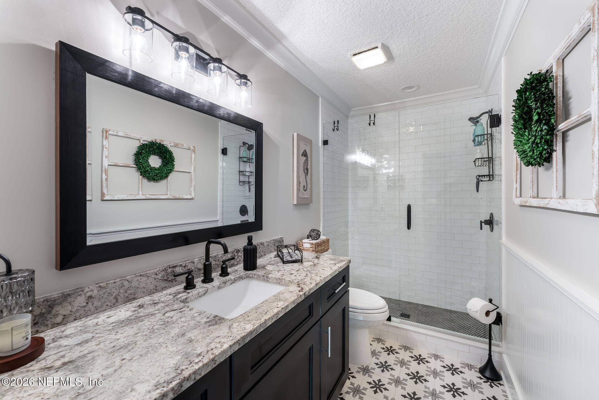 1204 Creek Bend Road St. Johns, FL 32259 - Photo 64 of 107 a bathroom with a granite countertop sink toilet and shower