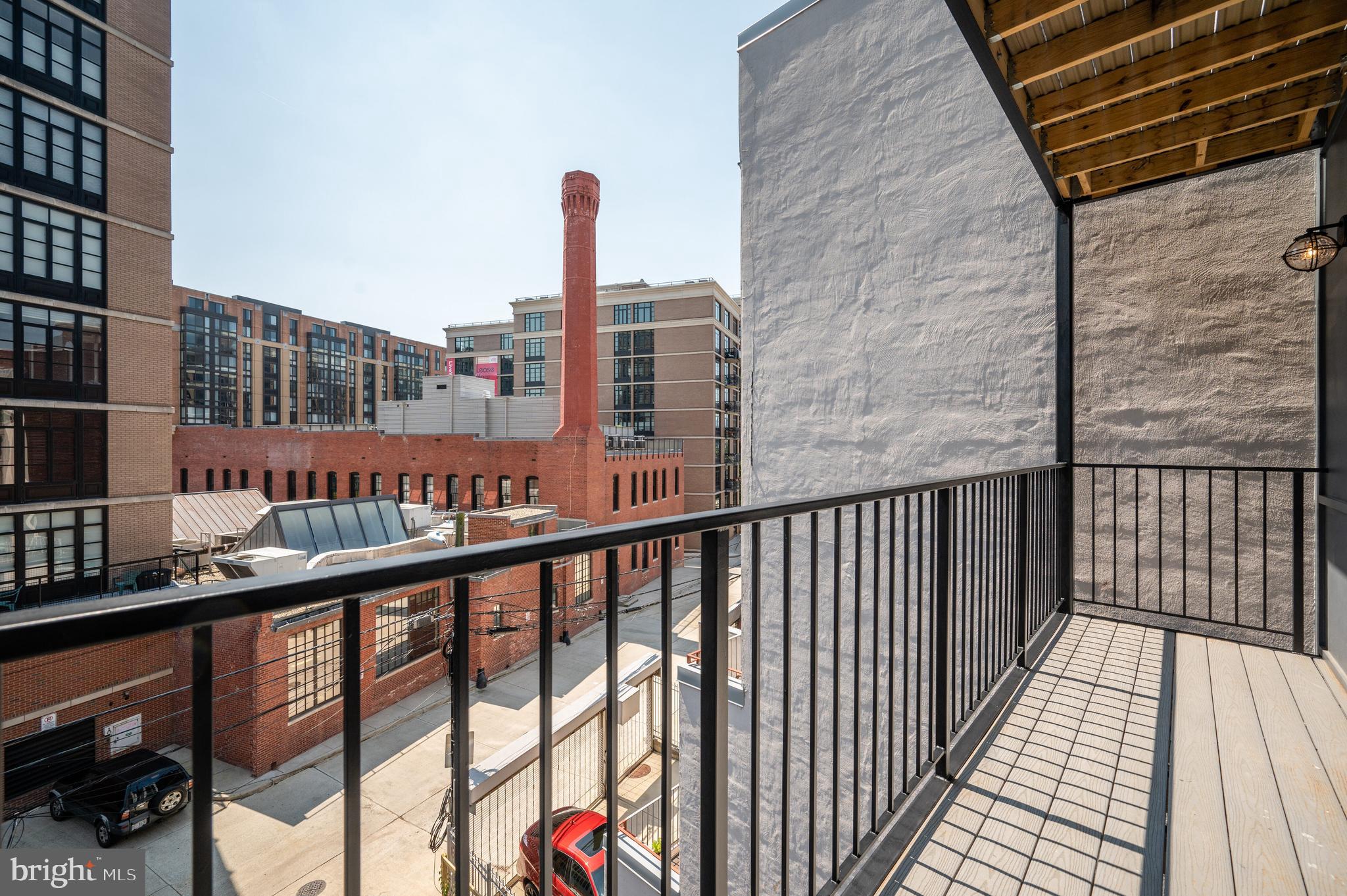 424 M Street Northwest, Unit 8 Washington, DC 20001 - Photo 4 of 27 a view of city from a balcony