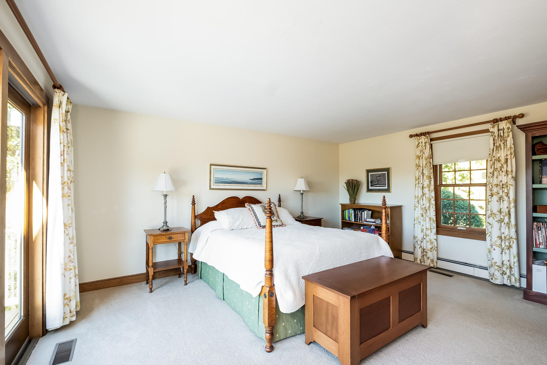 59 Bay Lane Centerville, MA 02632 - Photo 15 of 35 a bedroom with a bed and a cabinets next to a window