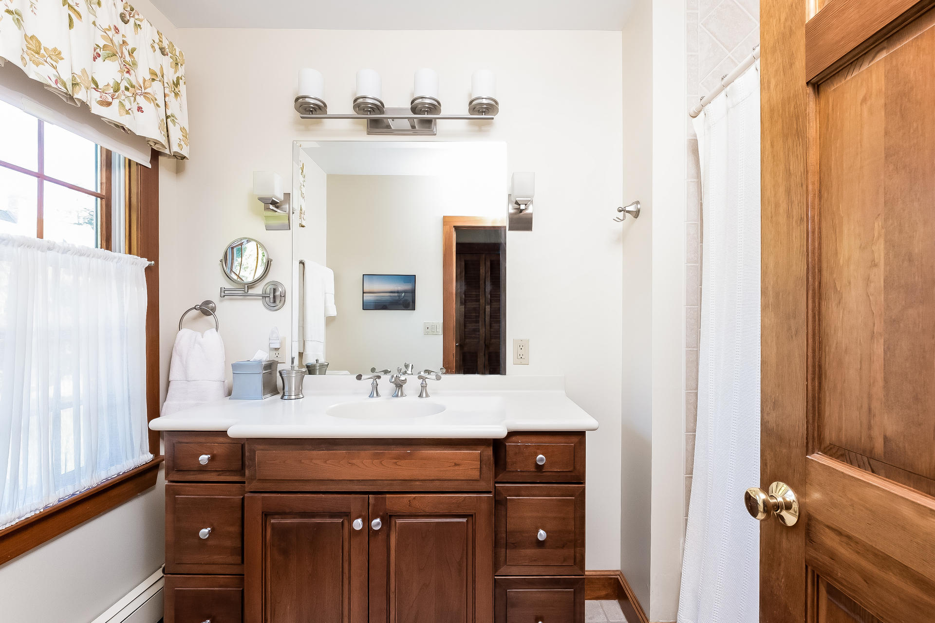 59 Bay Lane Centerville, MA 02632 - Photo 16 of 35 a bathroom with a sink and a mirror