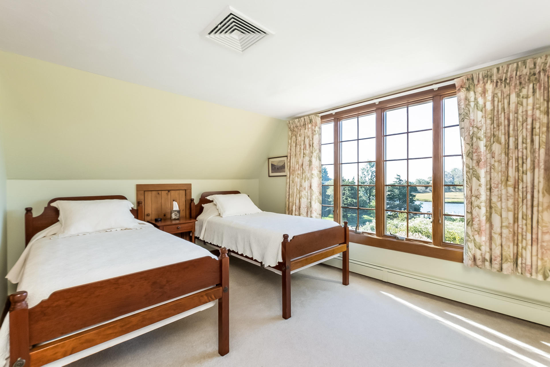 59 Bay Lane Centerville, MA 02632 - Photo 17 of 35 a bedroom with two beds and a large window