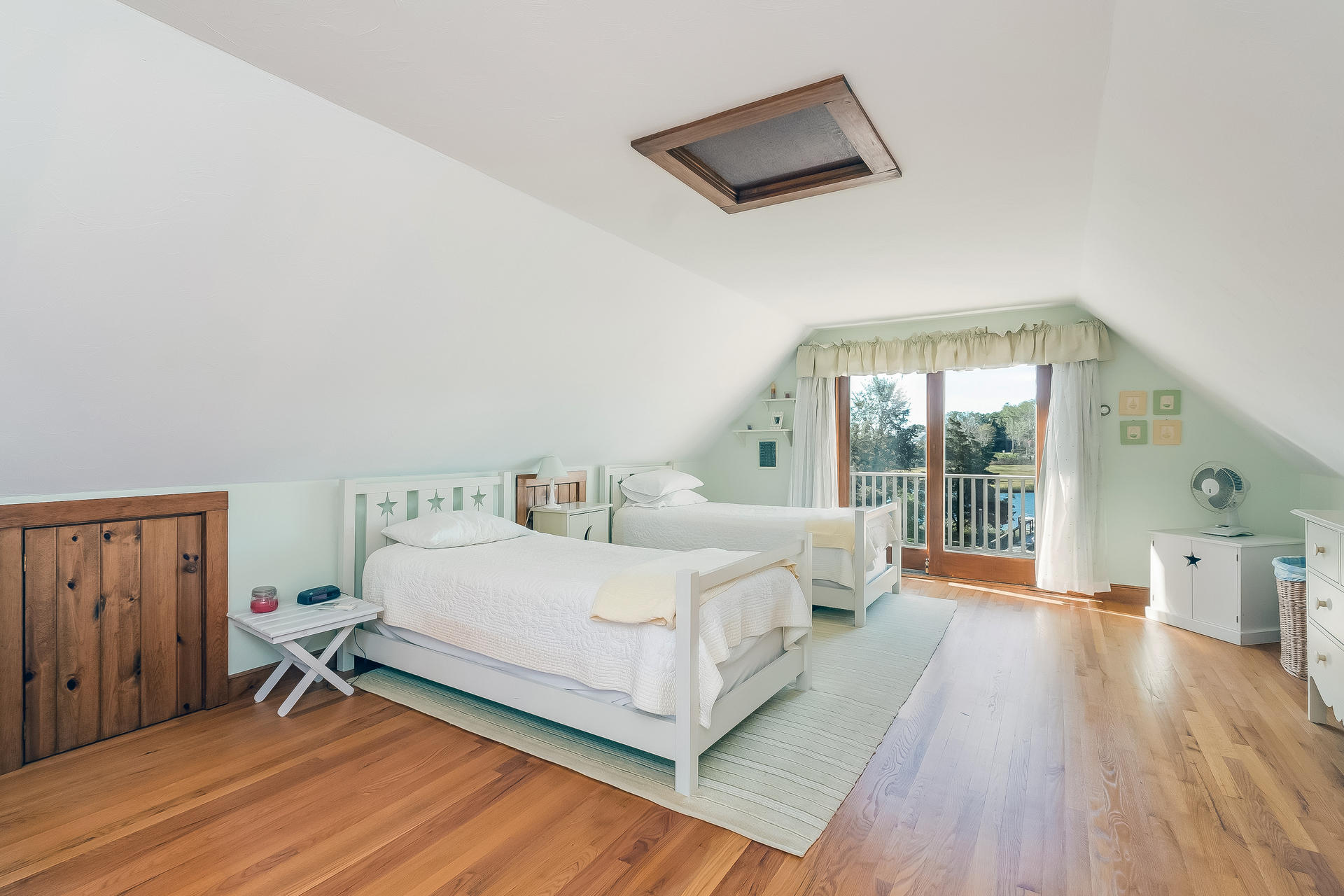 59 Bay Lane Centerville, MA 02632 - Photo 19 of 35 a bedroom with a bed and a large window