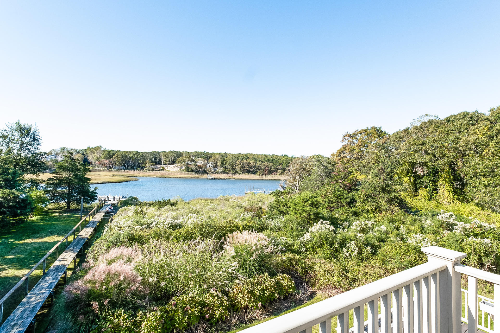 59 Bay Lane Centerville, MA 02632 - Photo 20 of 35 a view of a lake from a balcony