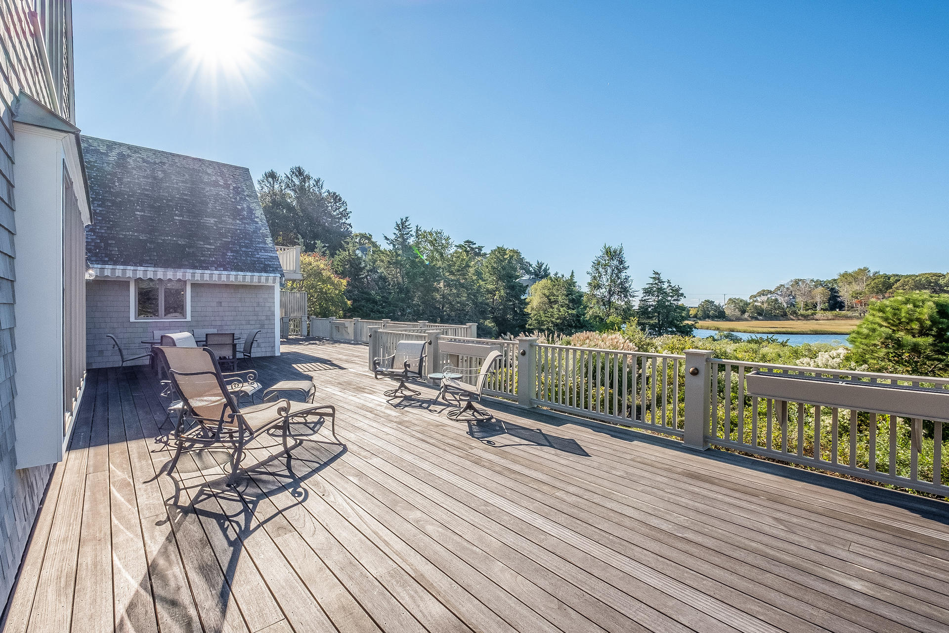 59 Bay Lane Centerville, MA 02632 - Photo 22 of 35 a view of balcony with furniture and wooden floor