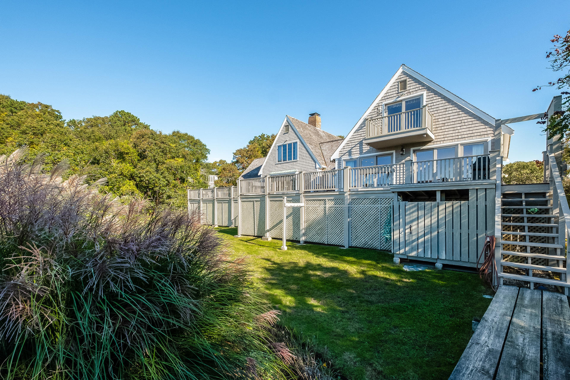 59 Bay Lane Centerville, MA 02632 - Photo 23 of 35 a view of a house with a yard