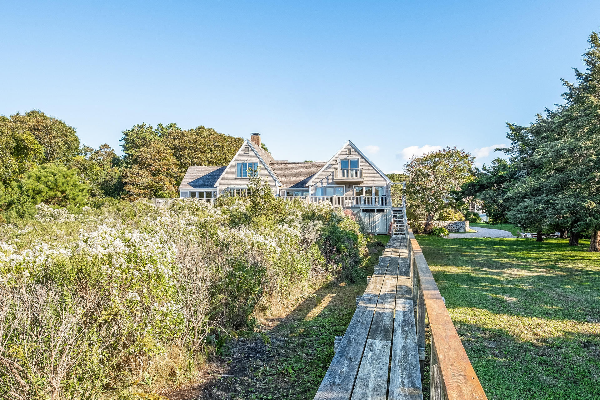 59 Bay Lane Centerville, MA 02632 - Photo 29 of 35 a view of a house with a yard