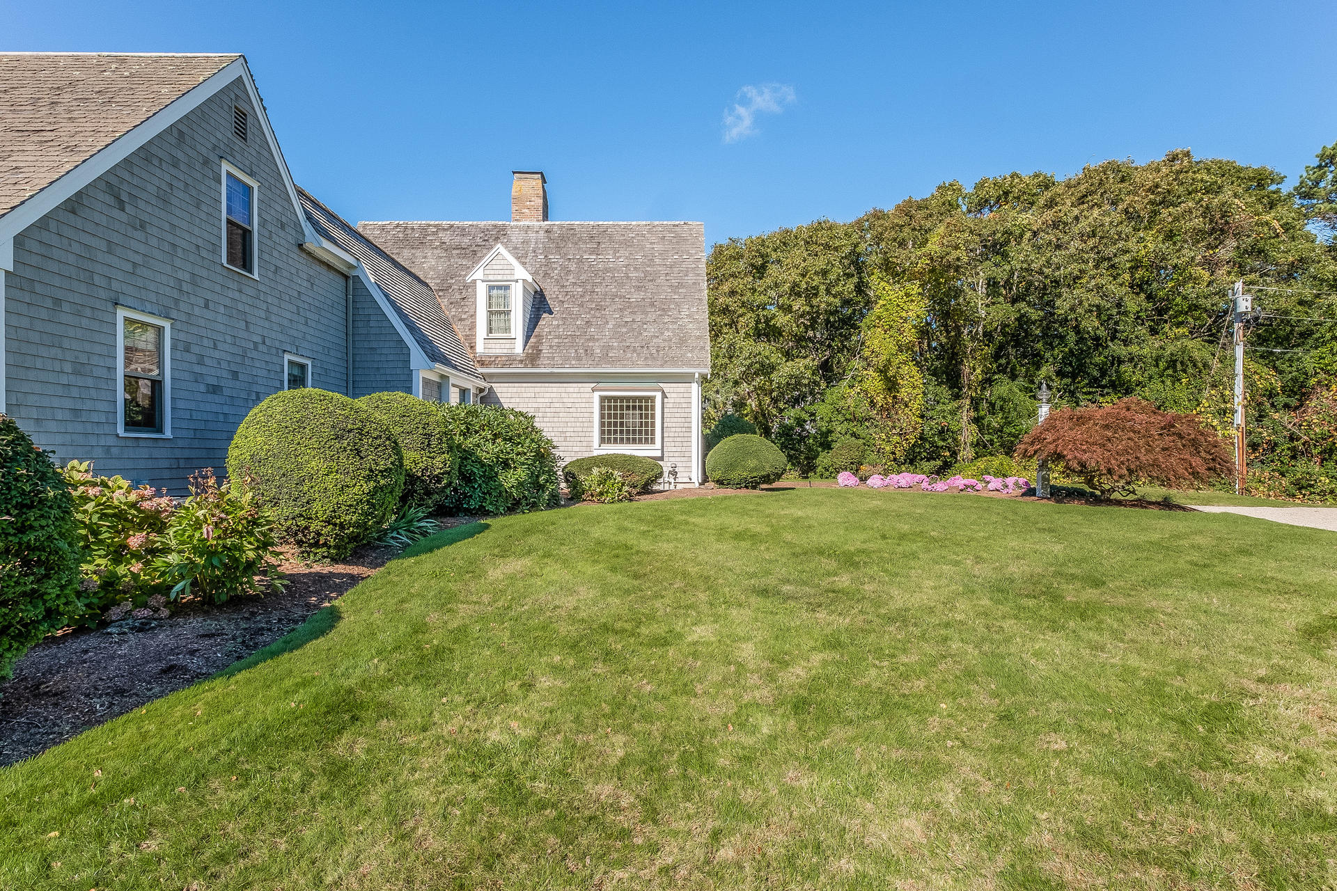 59 Bay Lane Centerville, MA 02632 - Photo 3 of 35 a view of a house with a garden