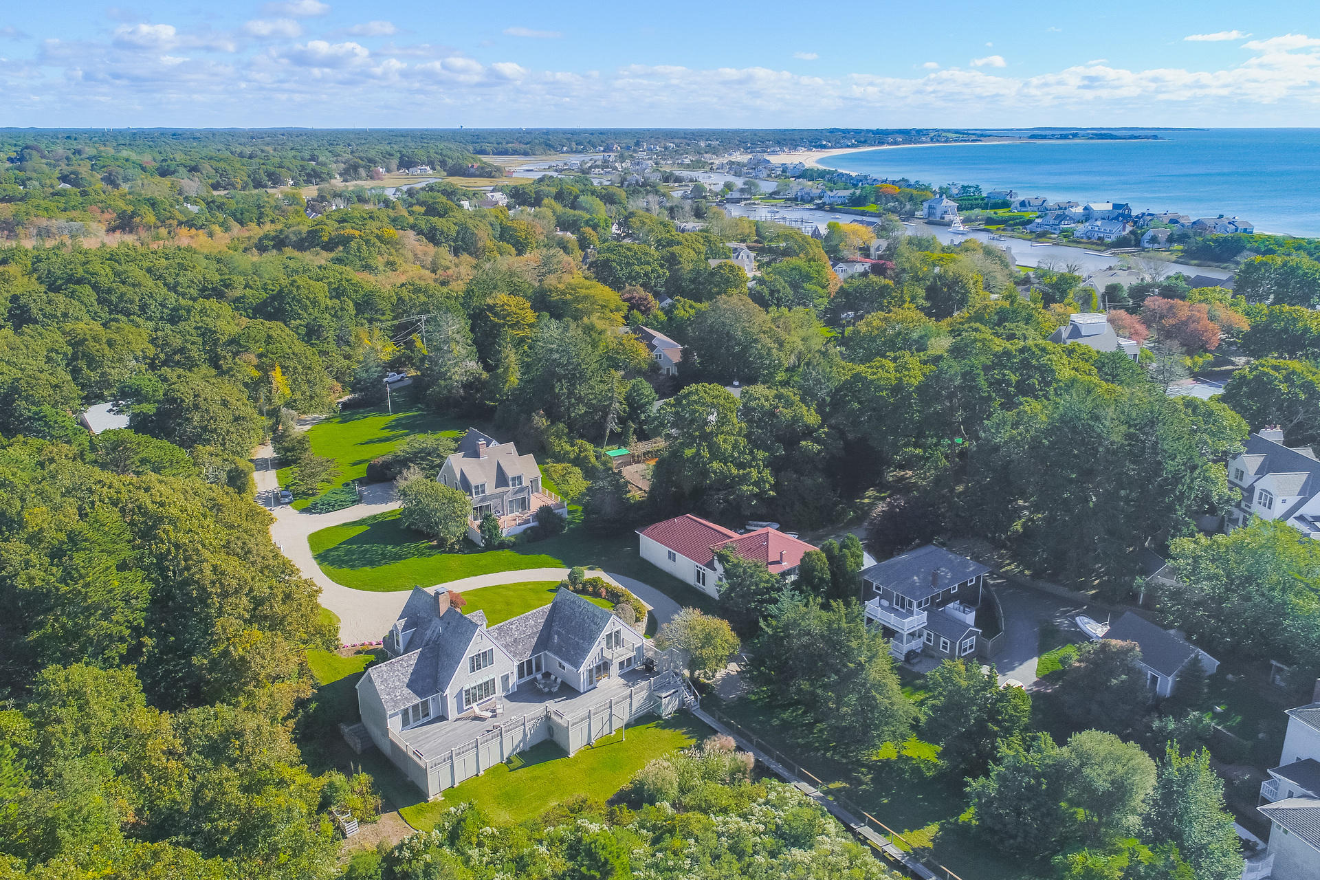 59 Bay Lane Centerville, MA 02632 - Photo 32 of 35 an aerial view of a house with a swimming pool yard and outdoor seating