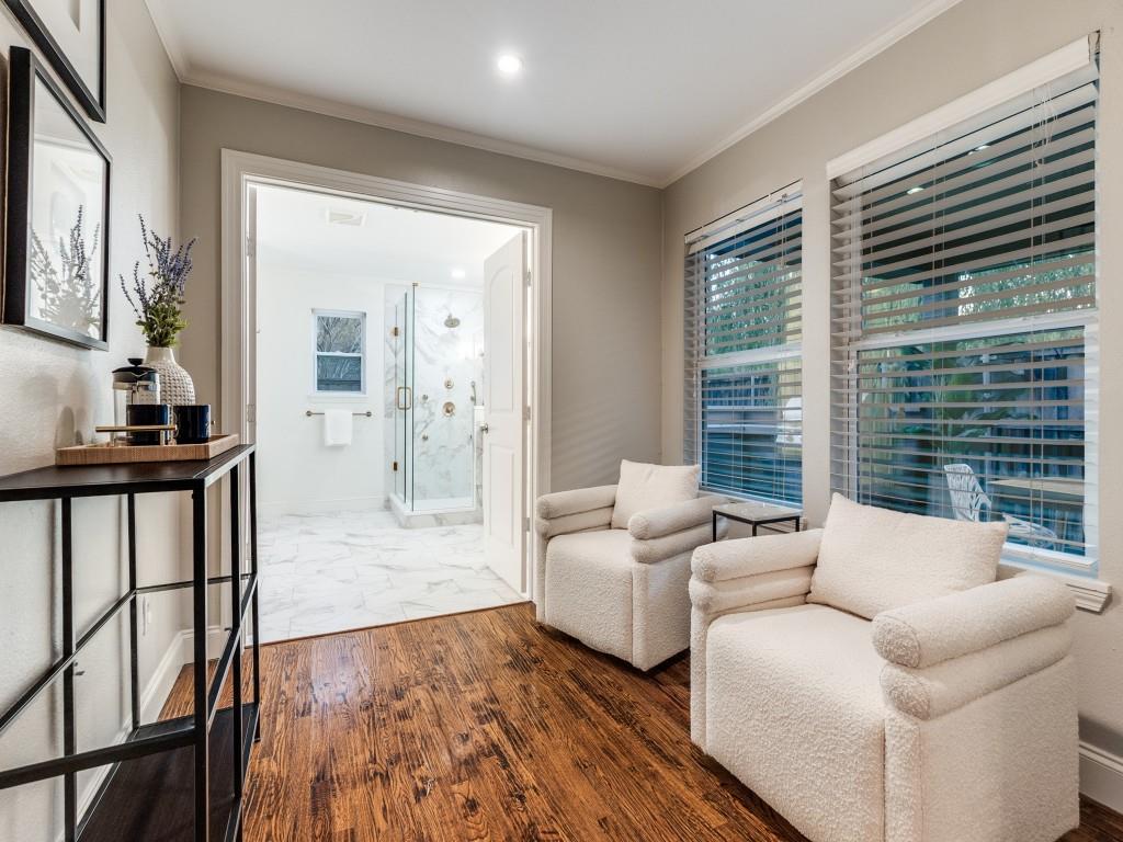 5514 Monticello Avenue Dallas, TX 75206 - Photo 10 of 20 a living room with furniture and a floor to ceiling window