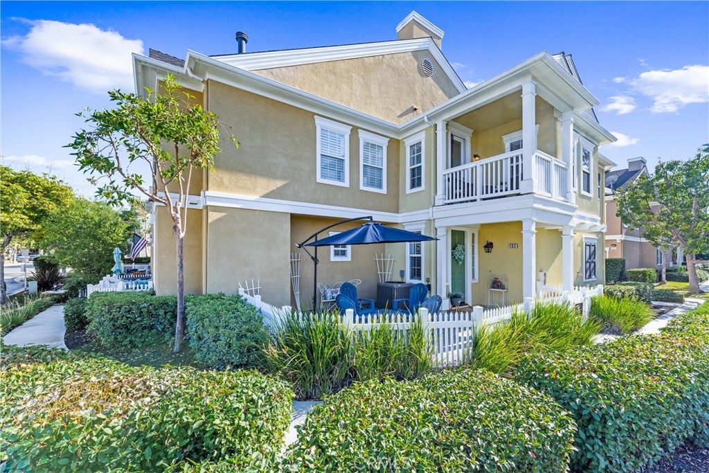 132 Strawflower Street Ladera Ranch, CA 92694 - Photo 1 of 1 a view of a brick building next to a yard