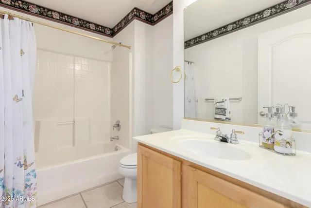 a bathroom with a sink a toilet and a bathtub