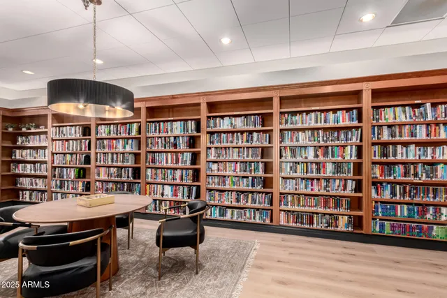 a view of a workspace with furniture