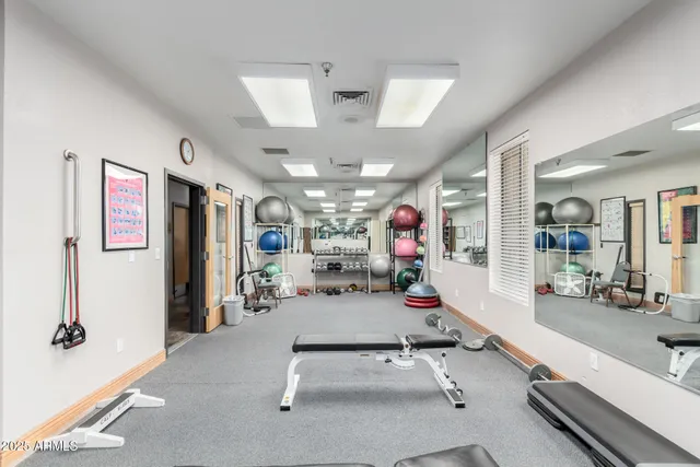 a view of a room with gym equipment