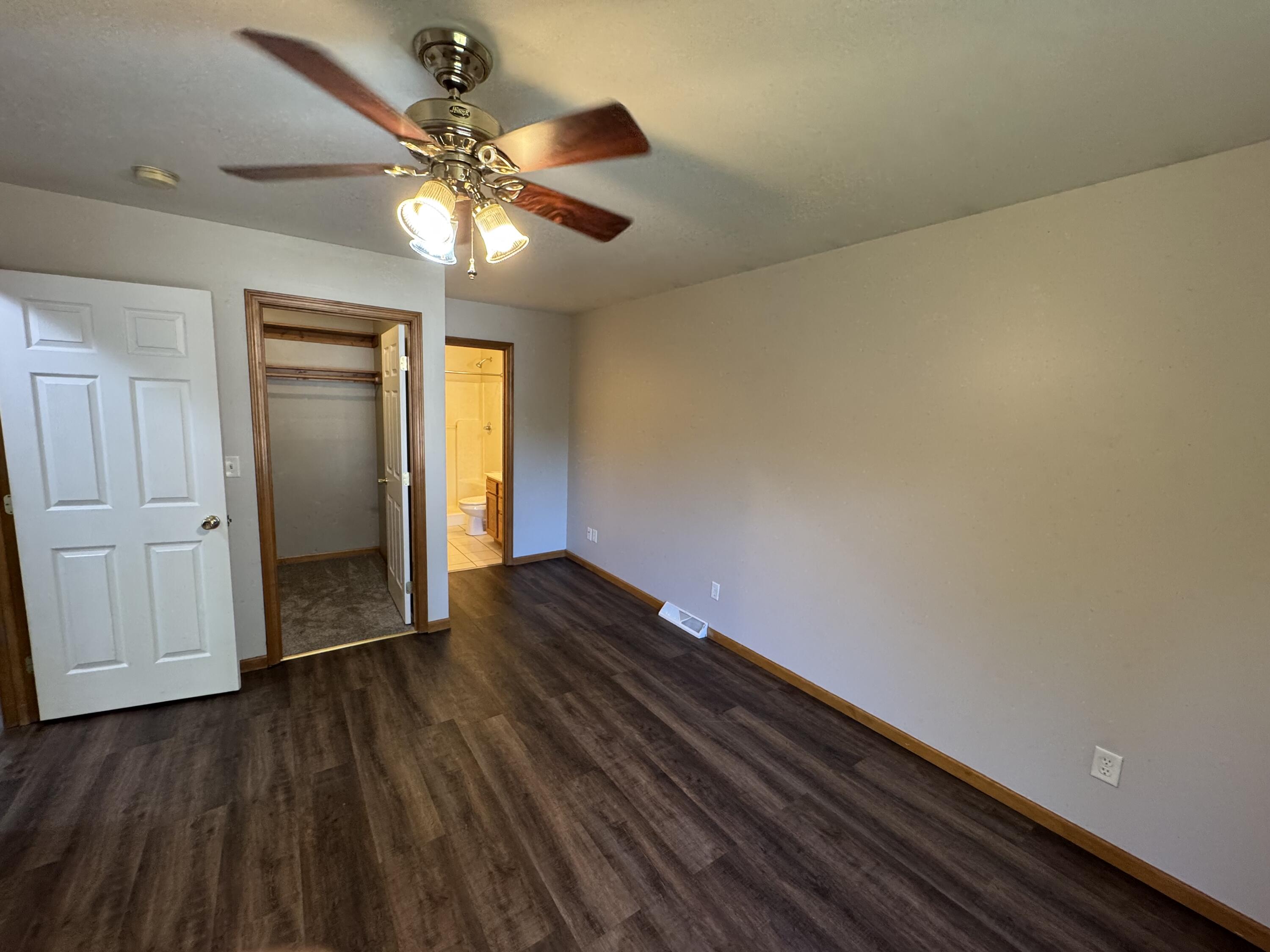 10603 Georgetown Drive Demotte, IN 46310 - Photo 15 of 31 a view of an empty room and wooden floor