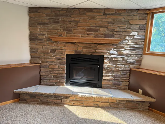 a living room with a fireplace