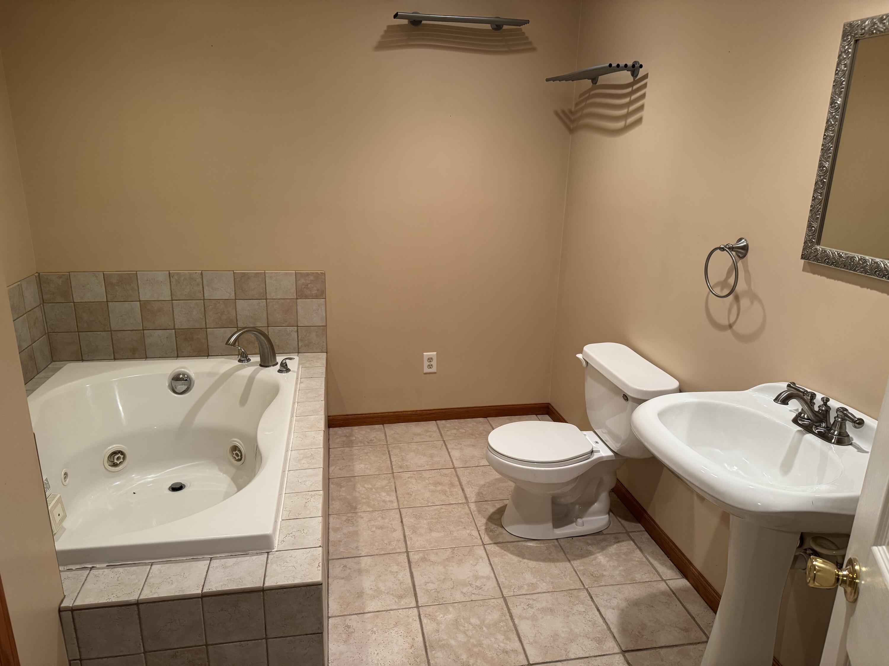 10603 Georgetown Drive Demotte, IN 46310 - Photo 23 of 31 a bathroom with a sink and a toilet