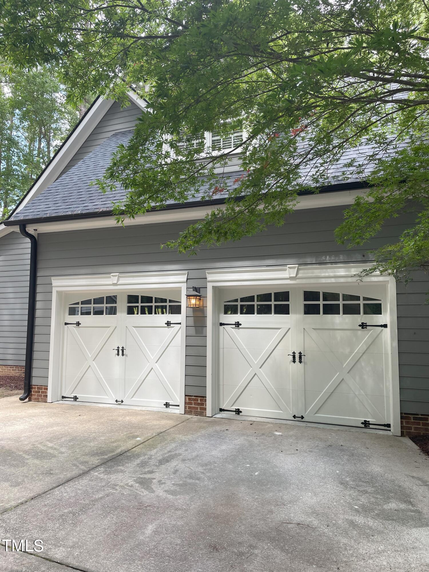 3033 Pearces Road Zebulon, NC 27597 - Photo 2 of 42 5_Outside Garage Doors