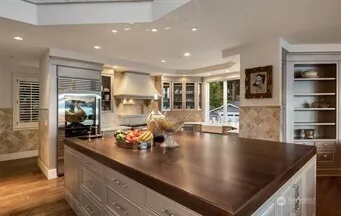 a work room with furniture and a window