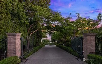 a view of a street with a building in the background