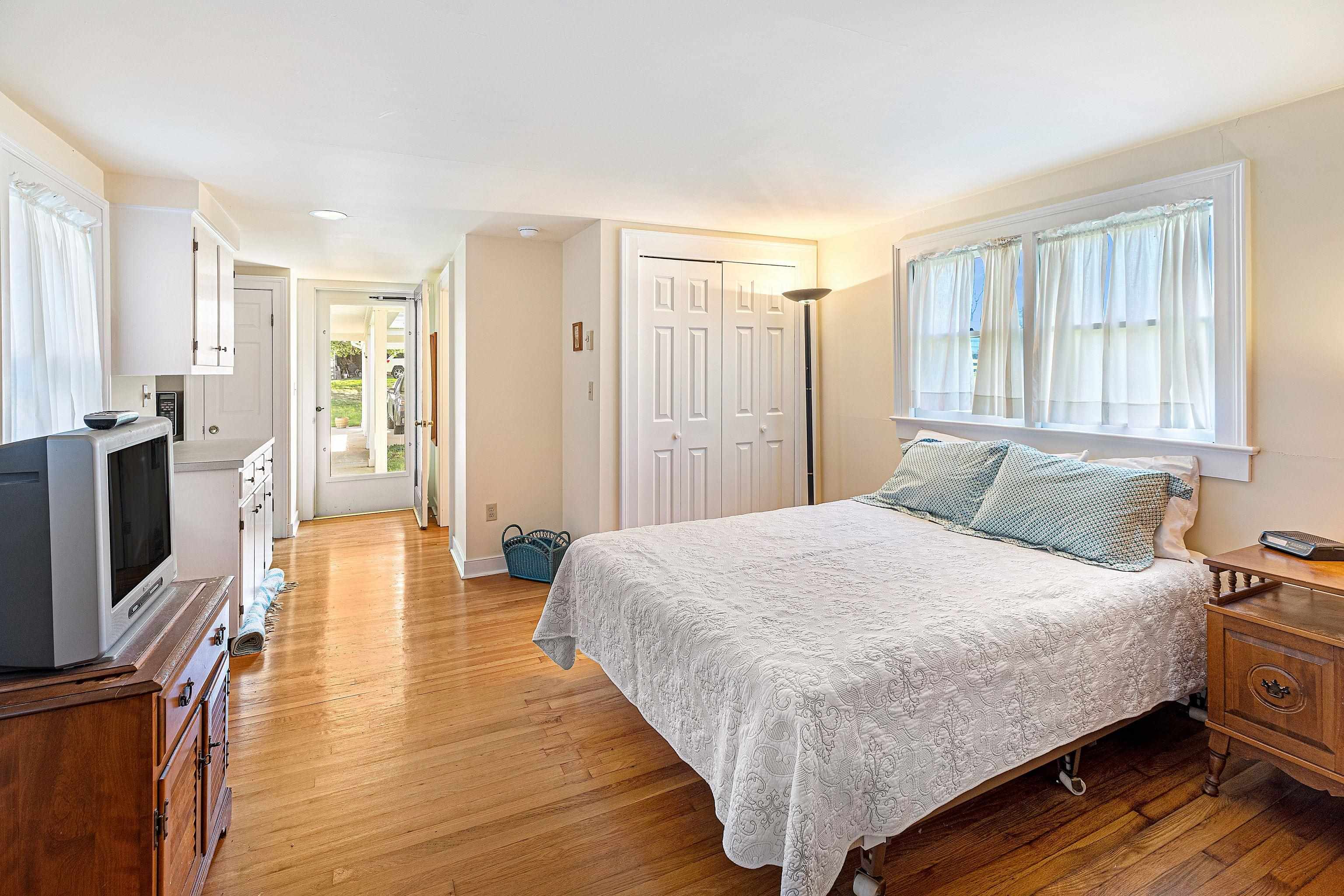 191 Middle River Road Staunton, VA 24401 - Photo 20 of 55 a bedroom with a bed and wooden floor