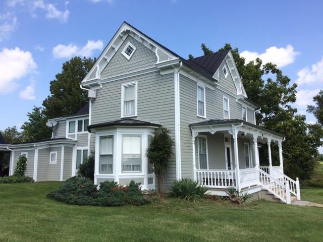 191 Middle River Road Staunton, VA 24401 - Photo 3 of 55 a front view of a house with a garden