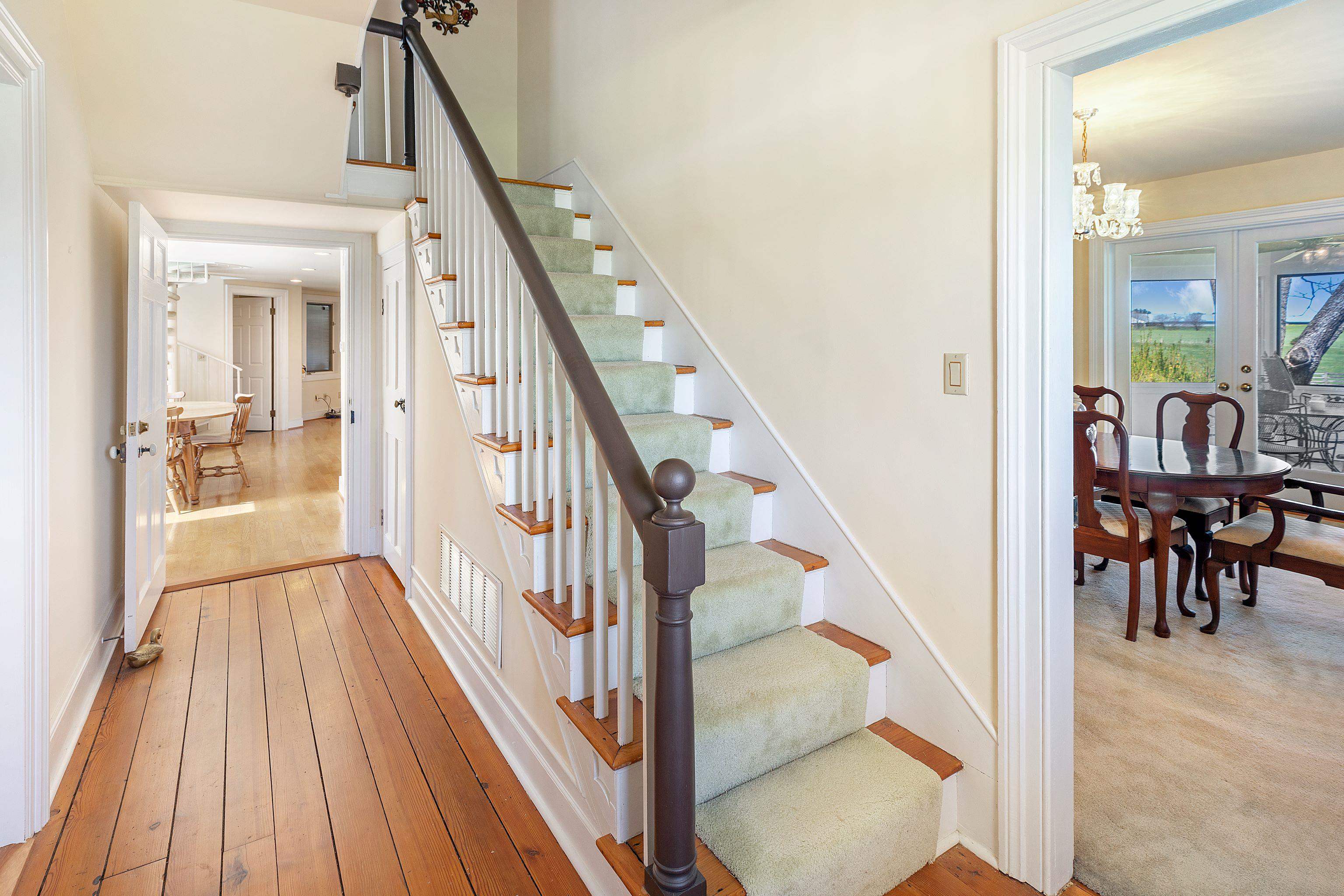 191 Middle River Road Staunton, VA 24401 - Photo 7 of 55 a view of a hallway with wooden floor and staircase