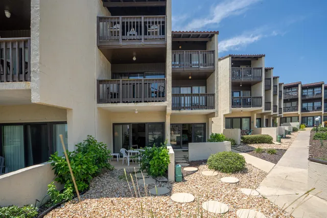 a view of swimming pool with a patio