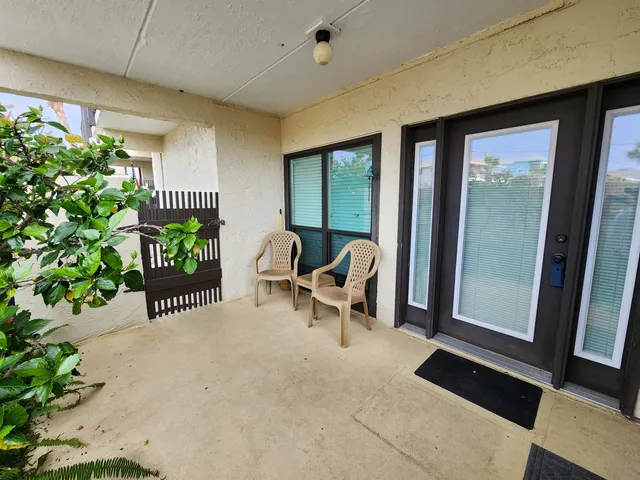 a kitchen with cabinets and window