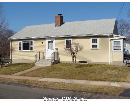 114 Wolcott Hill Road Wethersfield, CT 06109 - Photo 1 of 1 a front view of a house with garden