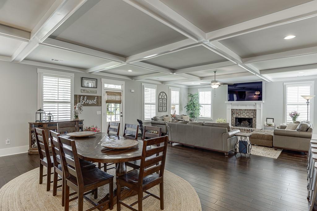 890 Smith Mill Road Winder, GA 30680 - Photo 22 of 95 a view of a dining room with furniture window and wooden floor