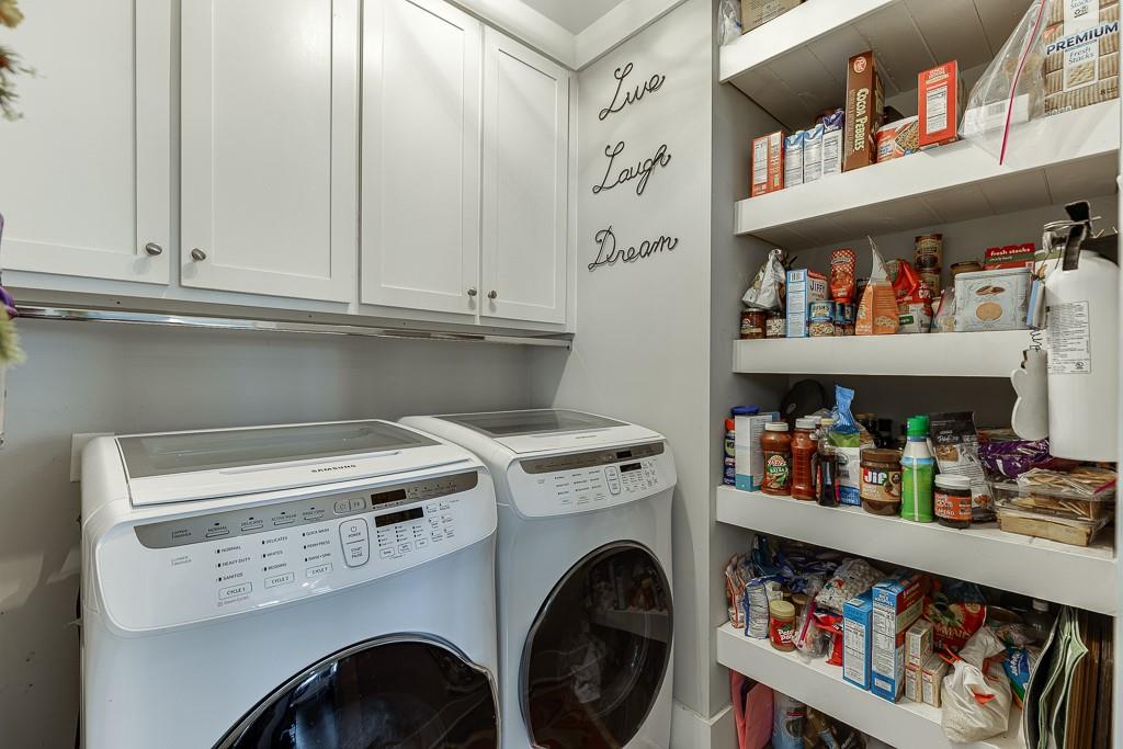 890 Smith Mill Road Winder, GA 30680 - Photo 24 of 95 a view of washer and dryer with kitchen racks
