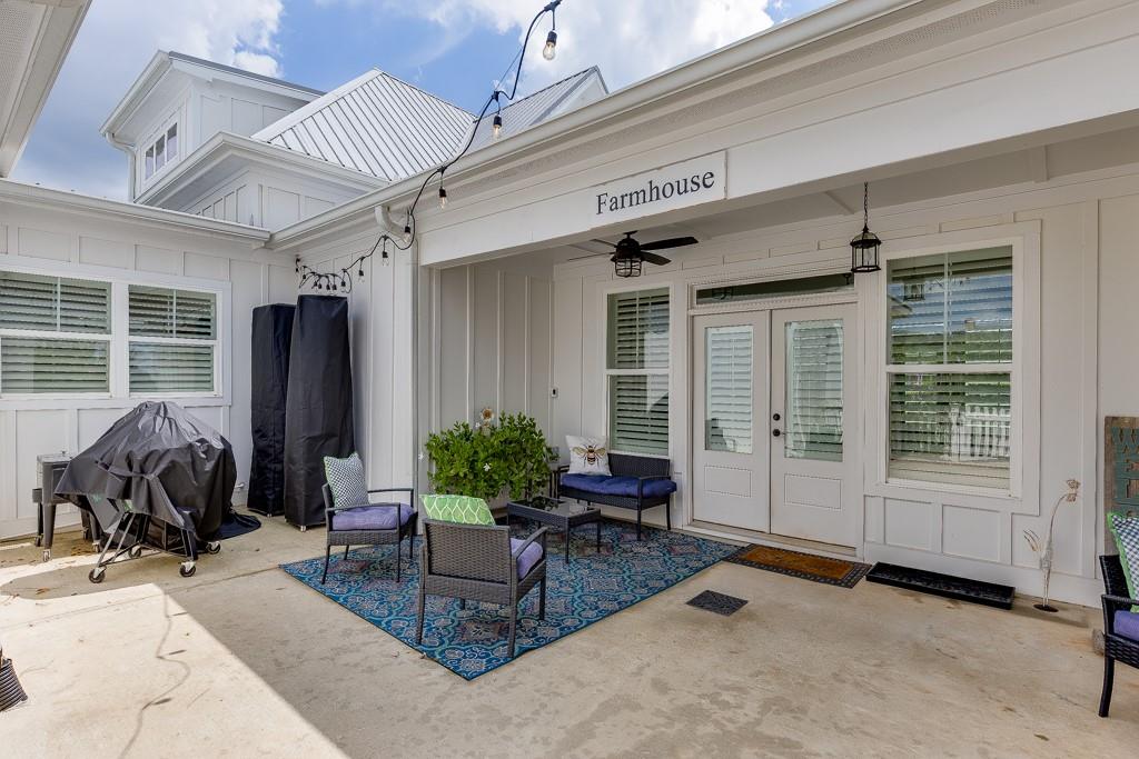 890 Smith Mill Road Winder, GA 30680 - Photo 56 of 95 a living room with furniture and potted plants