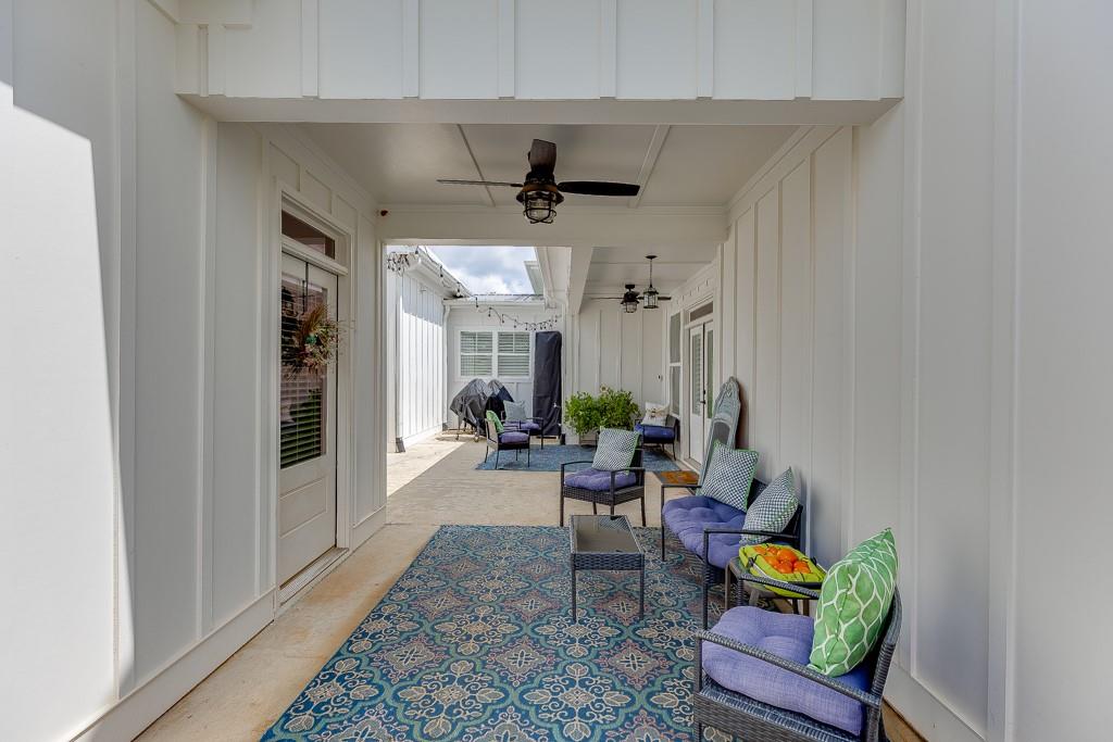 890 Smith Mill Road Winder, GA 30680 - Photo 57 of 95 a living room with furniture and a rug
