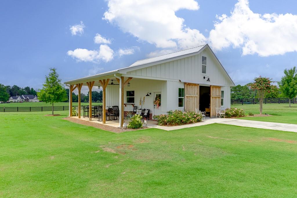 890 Smith Mill Road Winder, GA 30680 - Photo 72 of 95 a view of a house with backyard and porch