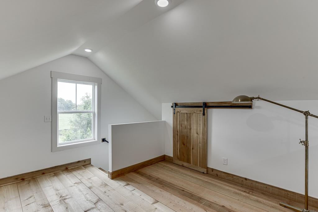 890 Smith Mill Road Winder, GA 30680 - Photo 81 of 95 an empty room with windows and closet