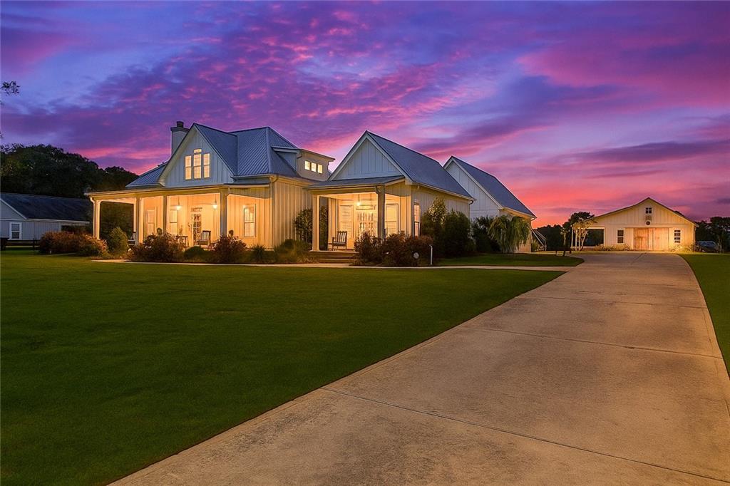 890 Smith Mill Road Winder, GA 30680 - Photo 92 of 95 a front view of a house with a yard